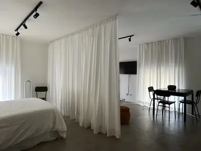 Letto o letti in una camera di Mini loft