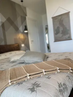 Letto o letti in una camera di B&B Perla sul mare