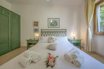 Letto o letti in una camera di CASA ISABELLA Relax con Piscina