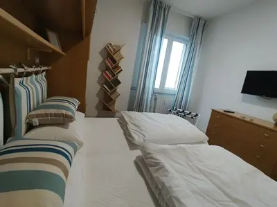 Letto o letti in una camera di 50 passi dal mare