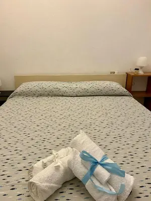 Letto o letti in una camera di La casa di Raffa