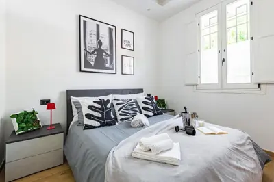 Letto o letti in una camera di The downtown loft Carpi Centro