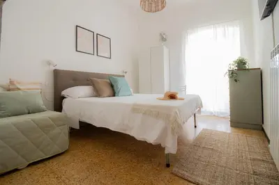 Letto o letti in una camera di 246 - Casa Marta, Centro Storico, 140metri dalla Baia del Silenzio PATRIMONIO UNESCO spiaggia e mare