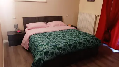 Letto o letti in una camera di CASA MARIA1