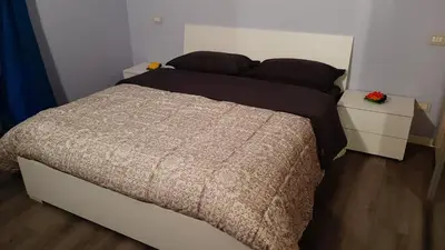 Letto o letti in una camera di CASA MARIA1