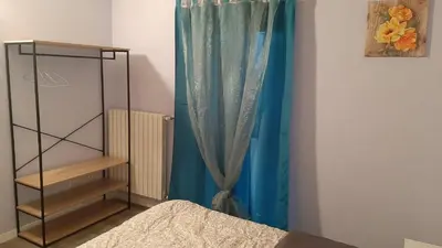 Letto o letti in una camera di CASA MARIA1