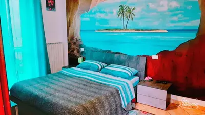 Letto o letti in una camera di Casa Maria 2
