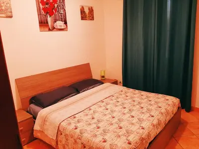 Letto o letti in una camera di Casa Maria 2
