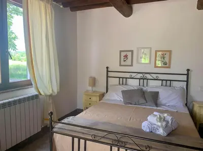 Letto o letti in una camera di Appartamento i Due Noci