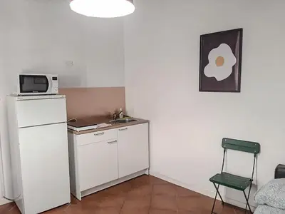 Cucina o angolo cottura di Beautiful Center Apartments - posti auto privati prenotabili