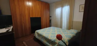 Letto o letti in una camera di MGC