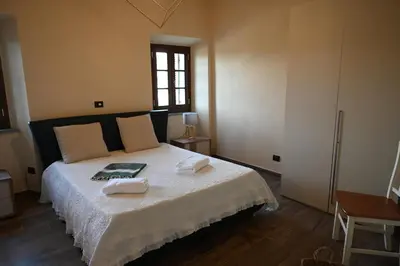 Letto o letti in una camera di Locanda Fermento