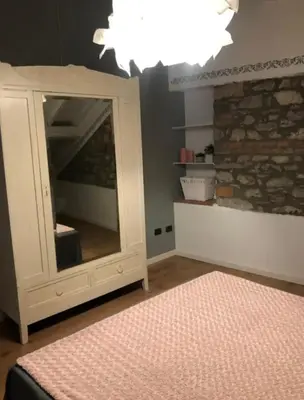 Letto o letti in una camera di Ca’ d’Irene