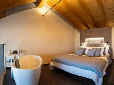 Letto o letti in una camera di Il Viaggio Impresa Sociale