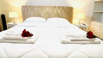 Letto o letti in una camera di Bellaria Portofino