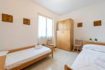 Letto o letti in una camera di Peaceful Apartment In Deiva Marina - Happy Rentals