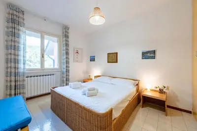 Letto o letti in una camera di Peaceful Apartment In Deiva Marina - Happy Rentals