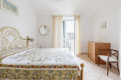 Letto o letti in una camera di Casa Mario, Levanto