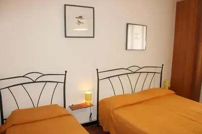 Letto o letti in una camera di Come a casa
