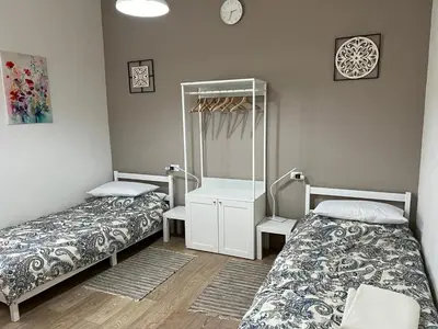 Letto o letti in una camera di Orchidea