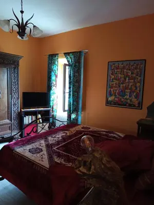 Letto o letti in una camera di B&BLe Tre Gemme