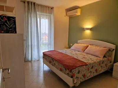 Letto o letti in una camera di [10 min. dalla spiaggia] Double Suite nel verde