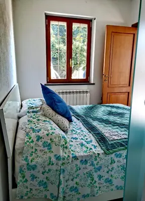 Letto o letti in una camera di Casun du Menegottu