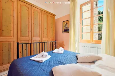Letto o letti in una camera di Maison Monterosso, TerreMarine