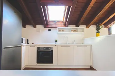 Cucina o angolo cottura di Castelletto - Armonia rustica e moderna