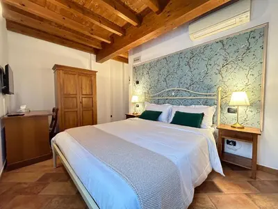 Letto o letti in una camera di Locanda Corte Ruspecchio
