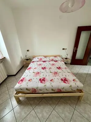 Letto o letti in una camera di Casa Anna Tornolo Val di Taro