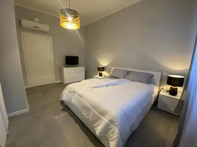 Letto o letti in una camera di APPARTAMENTO RACHELE