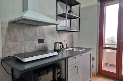 Cucina o angolo cottura di Attico con Parcheggio Privato