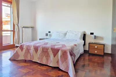 Letto o letti in una camera di Attico con Parcheggio Privato
