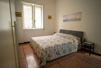 Letto o letti in una camera di Casa Edda