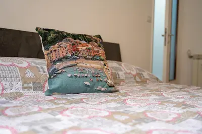 Letto o letti in una camera di Casa Edda