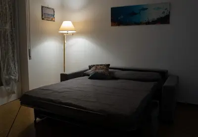 Letto o letti in una camera di Casa Edda