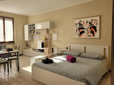 Letto o letti in una camera di Belgioioso Apartments - Monolocale
