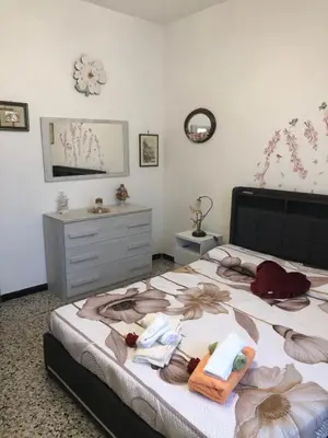 Letto o letti in una camera di La Primula Vicinanza 5 Terre