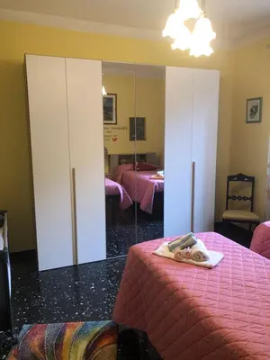 Letto o letti in una camera di La Primula Vicinanza 5 Terre