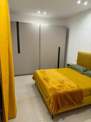 Letto o letti in una camera di Appartamento Umberto