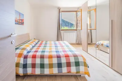Letto o letti in una camera di 267 - Casa Paradise B1, nel verde di Casarza a 15 minuti d'auto dal Mare - PARCHEGGIO PRIVATO INCLUSO