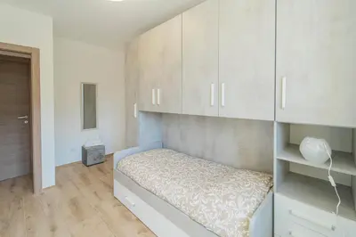 Letto o letti in una camera di 268 - Casa Paradise B2, nel verde di Casarza a 15 minuti d'auto dal Mare - PARCHEGGIO PRIVATO INCLUSO
