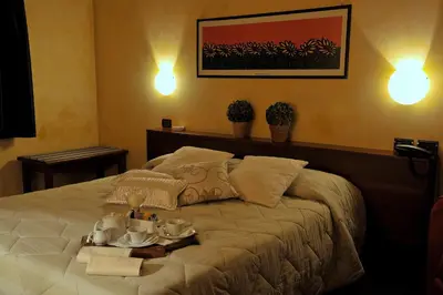 Letto o letti in una camera di Hotel Parco