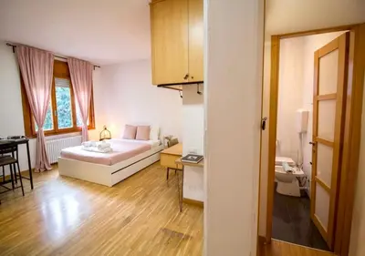 Letto o letti in una camera di Monolocale Flower - Comfort & Free WIFI - Arena RCF