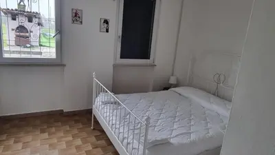Letto o letti in una camera di Casa di Alba - Alloggi turistici