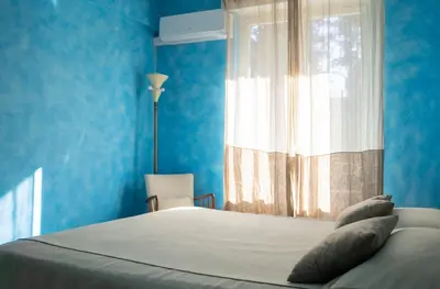 Letto o letti in una camera di La Casa di Potty