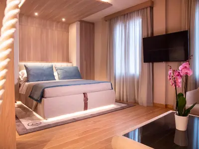 TV o dispositivi per l'intrattenimento presso Miramare Suites