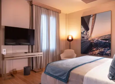 TV o dispositivi per l'intrattenimento presso Miramare Suites