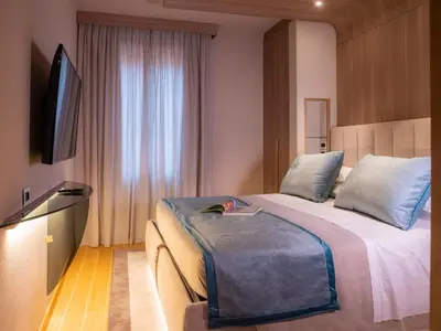 Letto o letti in una camera di Miramare Suites